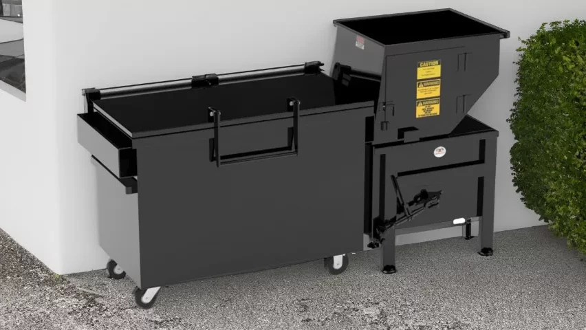 Apartment Style Compactors Under Trash Chutes Image